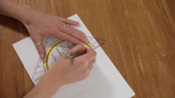 Drawn on white paper pencil images and drawings with a ruler — Stock Video