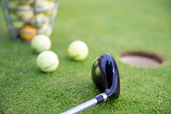 Golf equipment on green golf course — 스톡 사진