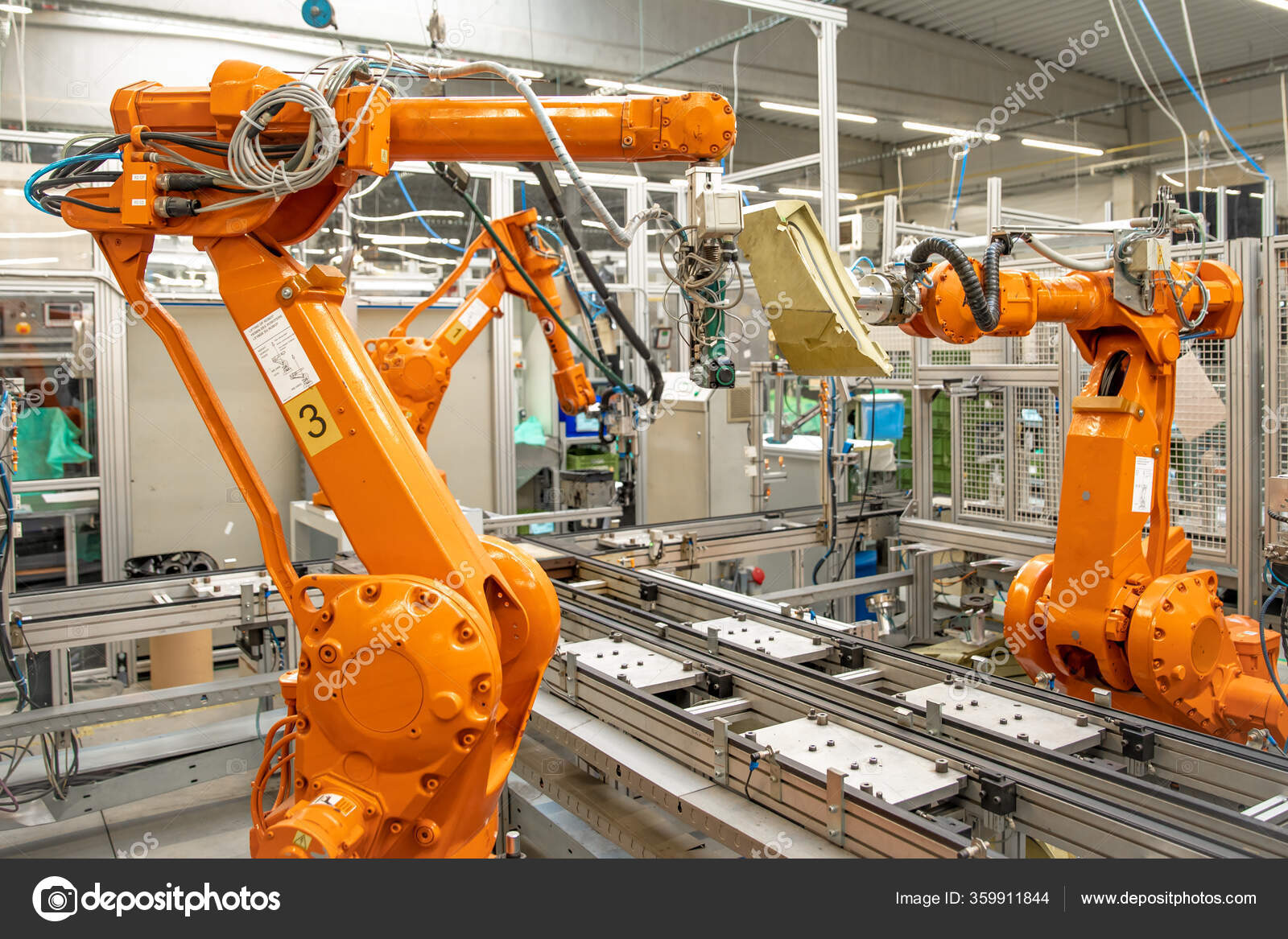 The use of robot arms in intelligent industrial factories — Stock