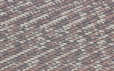 Çatıdaki kahverengi ve gri kiremitlerin dokusu