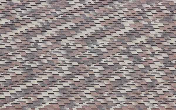 Çatıdaki kahverengi ve gri kiremitlerin dokusu