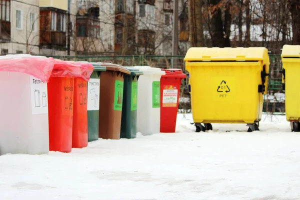 Different Colored Bins For Collection Of Recycle Materials