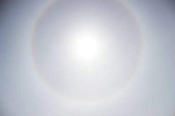 Halo a rainbow around the sun in the afternoon before the weather worsens