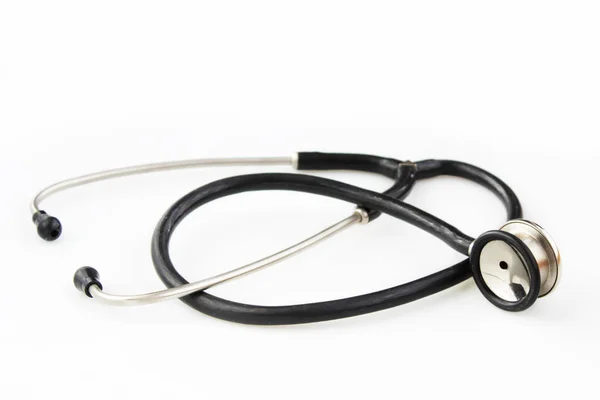 Old veterinary worker with a stethophonendoscope on a white background. — Stock Photo, Image