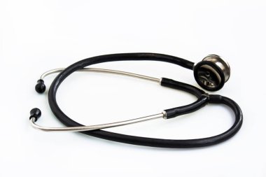 Beyaz bir arka plan üzerinde eski veteriner stethophonendoscope.