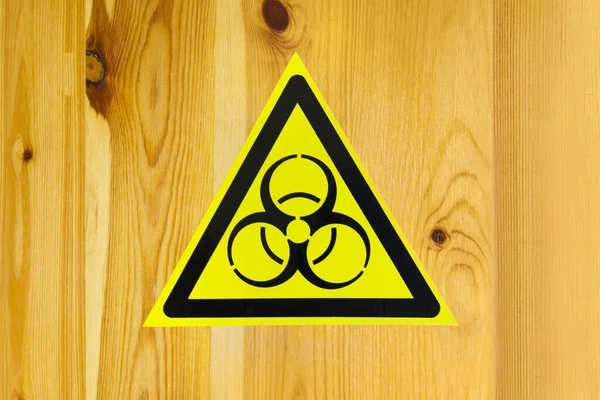 用于警告题词的生物危险和生物武器的标志 木制底座贴纸 — 图库照片