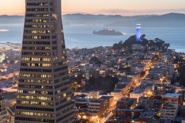 Dusk over Telegraph Hill, Alcatraz Island and San Francisco Bay from the Financial District. clipart