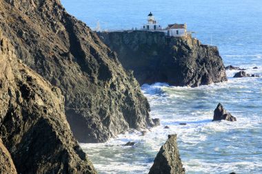 Point Bonita Lighthouse in Marin Headlands. Seen from Battery Mendell Trail in Point Bonita, Marin County, California, USA. clipart