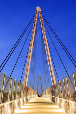 Don Burnett Bicycle-Pedestrian Bridge (aka Mary Avenue Bicycle Footbridge) on a clear winter evening. Cupertino, Santa Clara County, California, USA. clipart