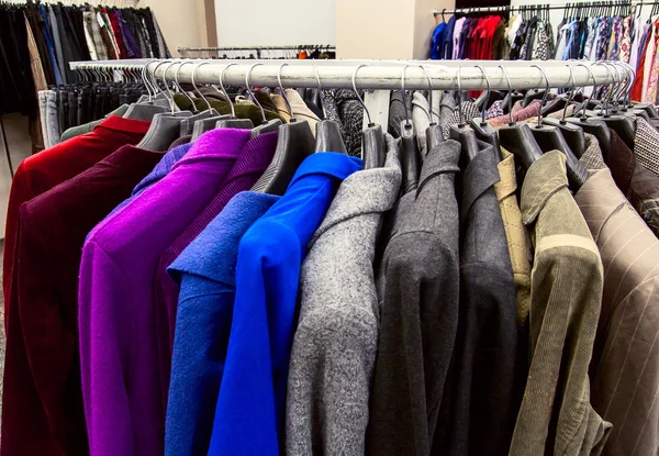 Rows of clothes. Clothes on a hanger in the store — Stock Photo, Image