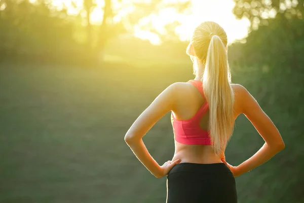 ealthy sports lifestyle. Athletic young woman in sports dress doing fitness exercise. Fitness woman.