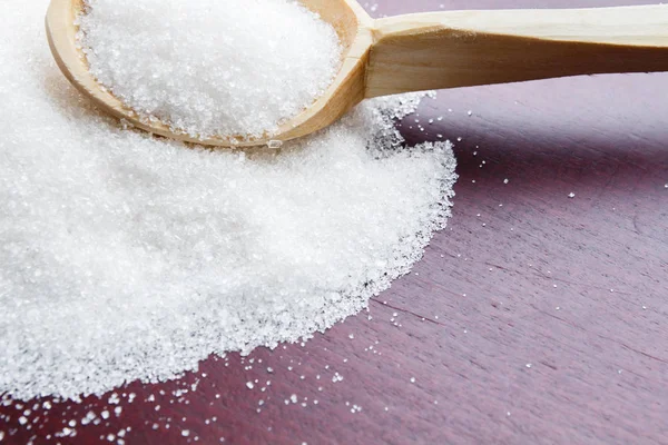 Sugar on wooden table. Selective focus — Stock Photo, Image