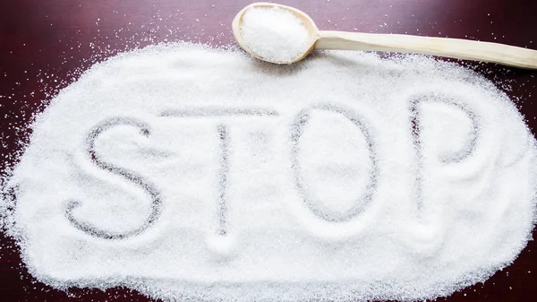 Word "STOP" in sugar — Stock Photo, Image