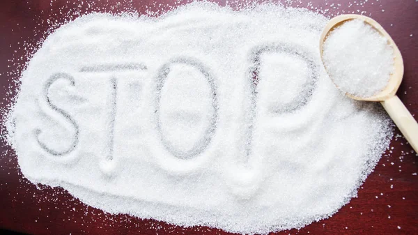 Word "STOP" in sugar — Stock Photo, Image
