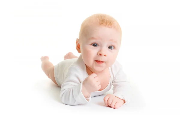 Ein Kleines Monate Altes Baby Liegt Auf Einer Weißen Oberfläche — Stockfoto