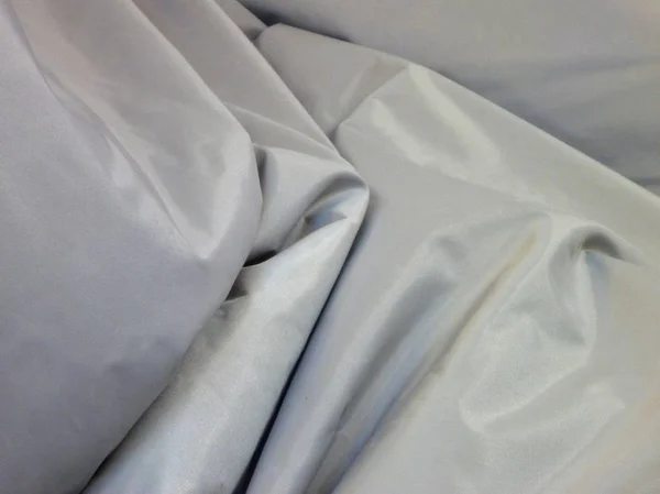 Текстура серой морщинистой ткани — стоковое фото