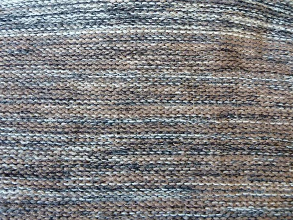 Textura de camisola de lã de malha com melange marrom — Fotografia de Stock