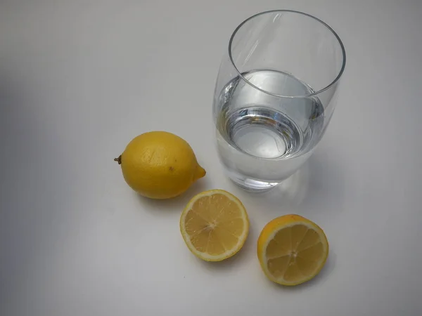 Glass of pure water with lemon — Stock Photo, Image