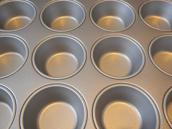 Prázdné kovovou formu na muffiny — Stock fotografie