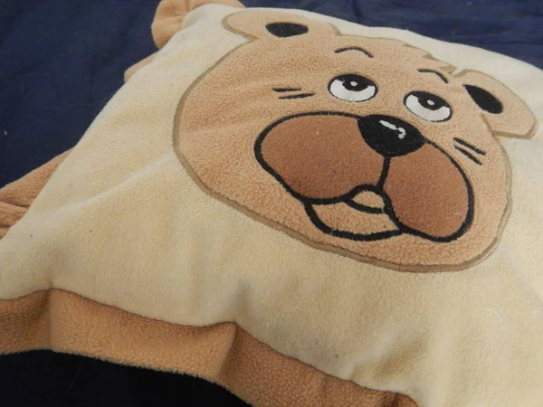 Yellow and brown teddy bear pillow — Stock Photo, Image