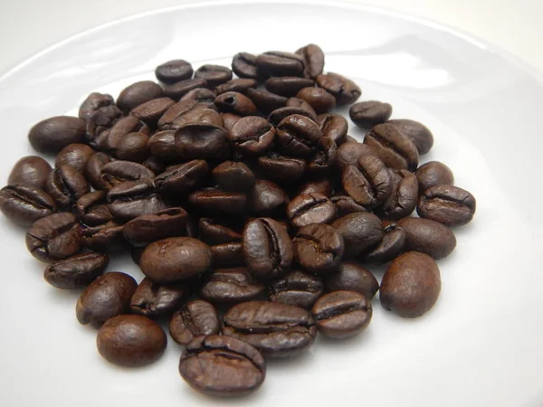 Small heap of coffee beans — Stock Photo, Image