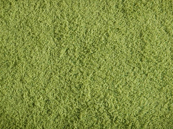 Groene tapijt textuur met hoge haren — Stockfoto