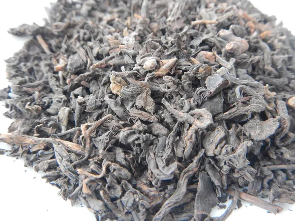 Detail eines Pu-Erh-Tees trockene Blätter — Stockfoto