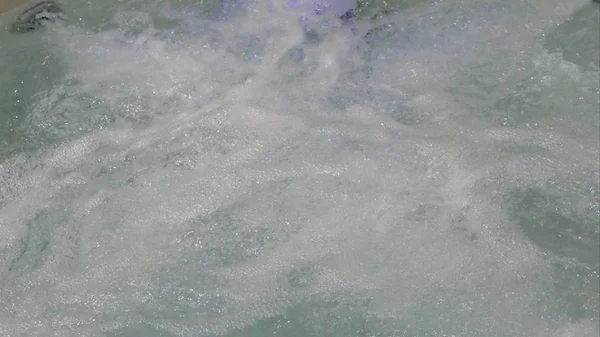 Textura de un agua ondulada — Foto de Stock