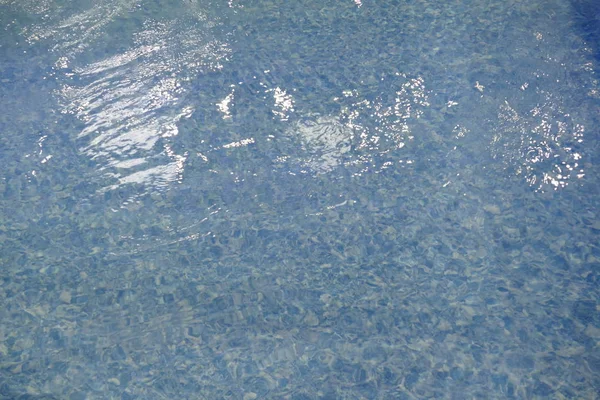 Textura de un agua ondulada — Foto de Stock