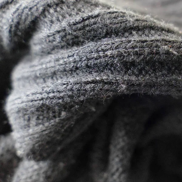 Lã preta tecida camisola quente — Fotografia de Stock