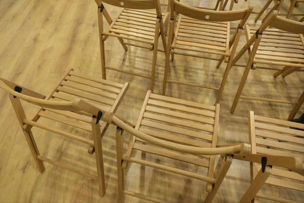 Lines of wooden chairs prepared for audience — Stock Photo, Image