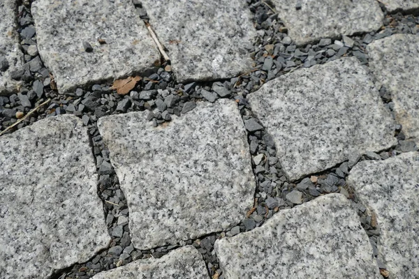 Detalhe da textura de rua calçada — Fotografia de Stock