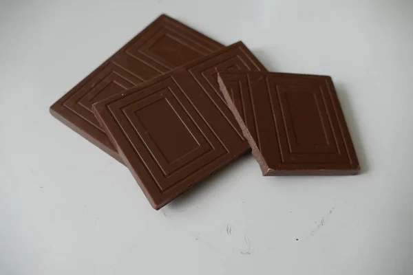 Portion of sweet milk brown chocolate — Stock Photo, Image