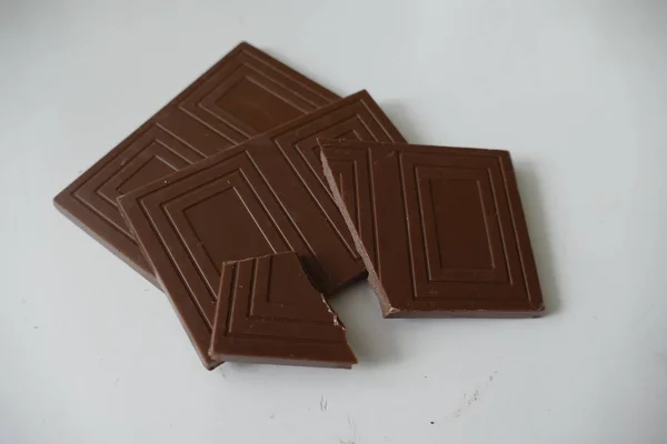 Portion of sweet milk brown chocolate — Stock Photo, Image