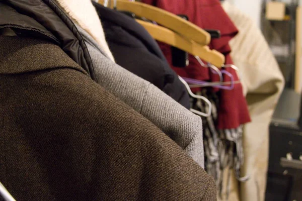 Clothes on a coat hanger — Stock Photo, Image