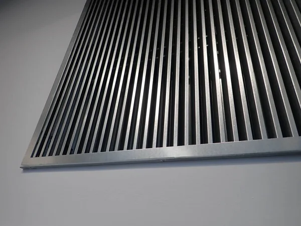 Una griglia di ventilazione interna in una parete — Foto Stock