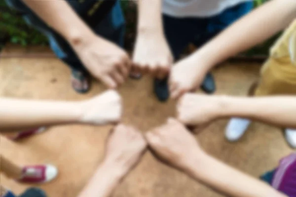 Imagem turva das mãos era um conceito de colaboração do trabalho em equipe — Fotografia de Stock