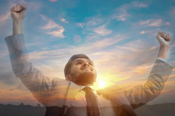 Double exposure of businessman with some success story and sunse Stock Picture