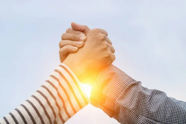 Two hand handshake friendly,hand in teamwork concept