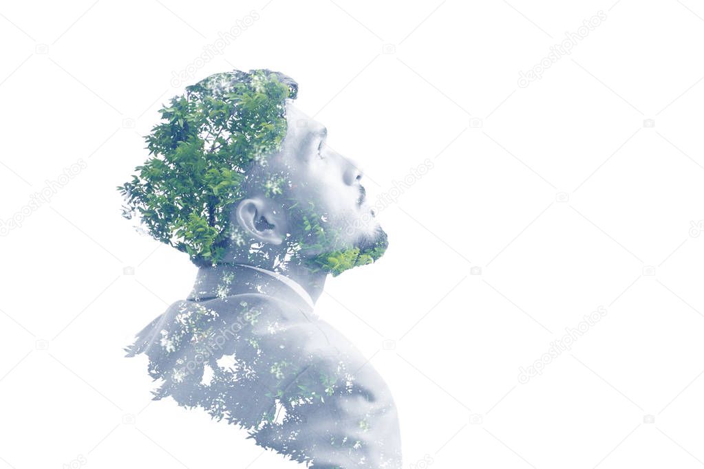 Double exposure of businessman and tree on white background
