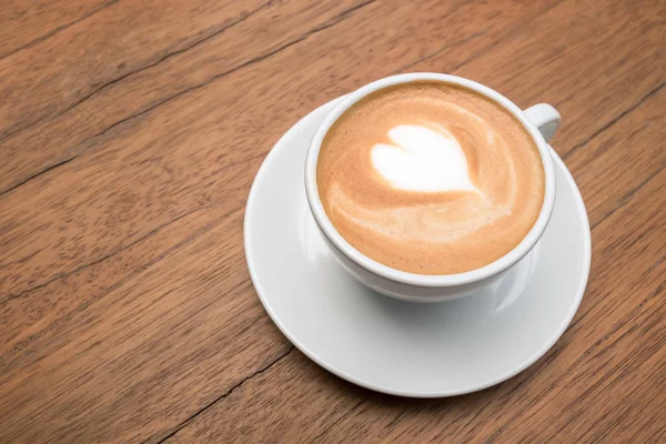 Arte tardia café quente no chão de madeira — Fotografia de Stock