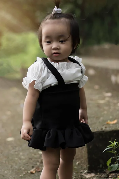 stock image Happy Asian baby girl playing in the garden