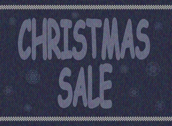 Christmas advertising text on background of knitted texture.