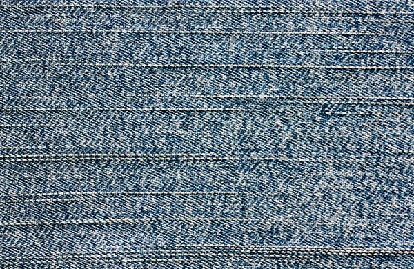 Blauer Hintergrund aus Jeansstoff. — Stockfoto