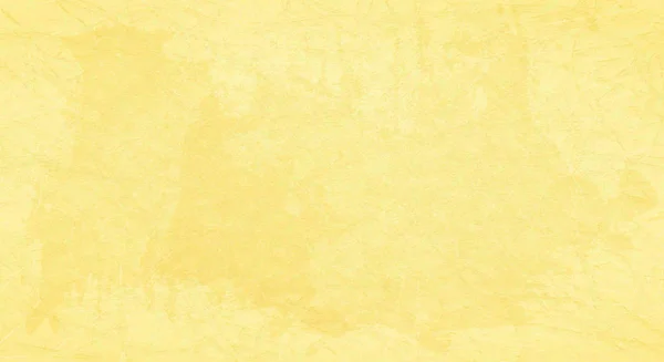 Gelber zerkratzter Hintergrund mit Farbflecken. — Stockfoto