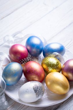 Mutlu Paskalyalar! Paskalya yumurtaları. Paskalya arka plan. Renkli Paskalya yumurtaları