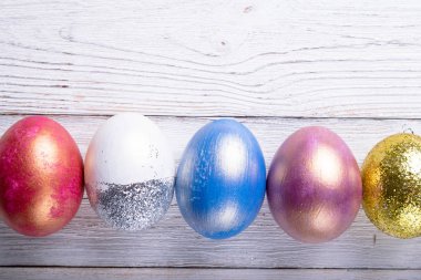 Mutlu Paskalyalar! Paskalya yumurtaları. Paskalya arka plan. Renkli Paskalya yumurtaları