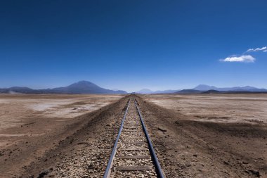 Train tracks in the desert in the Potosi Region in Bolivia, South America clipart