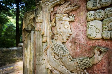 Bas-relief carving in the ancient Mayan city of Palenque, Chiapas, Mexico clipart