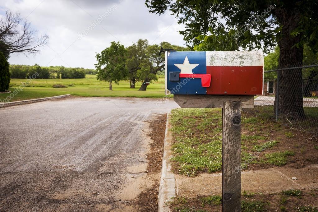 Mailbox painted with the Texas Flag in a street in Texas, USA